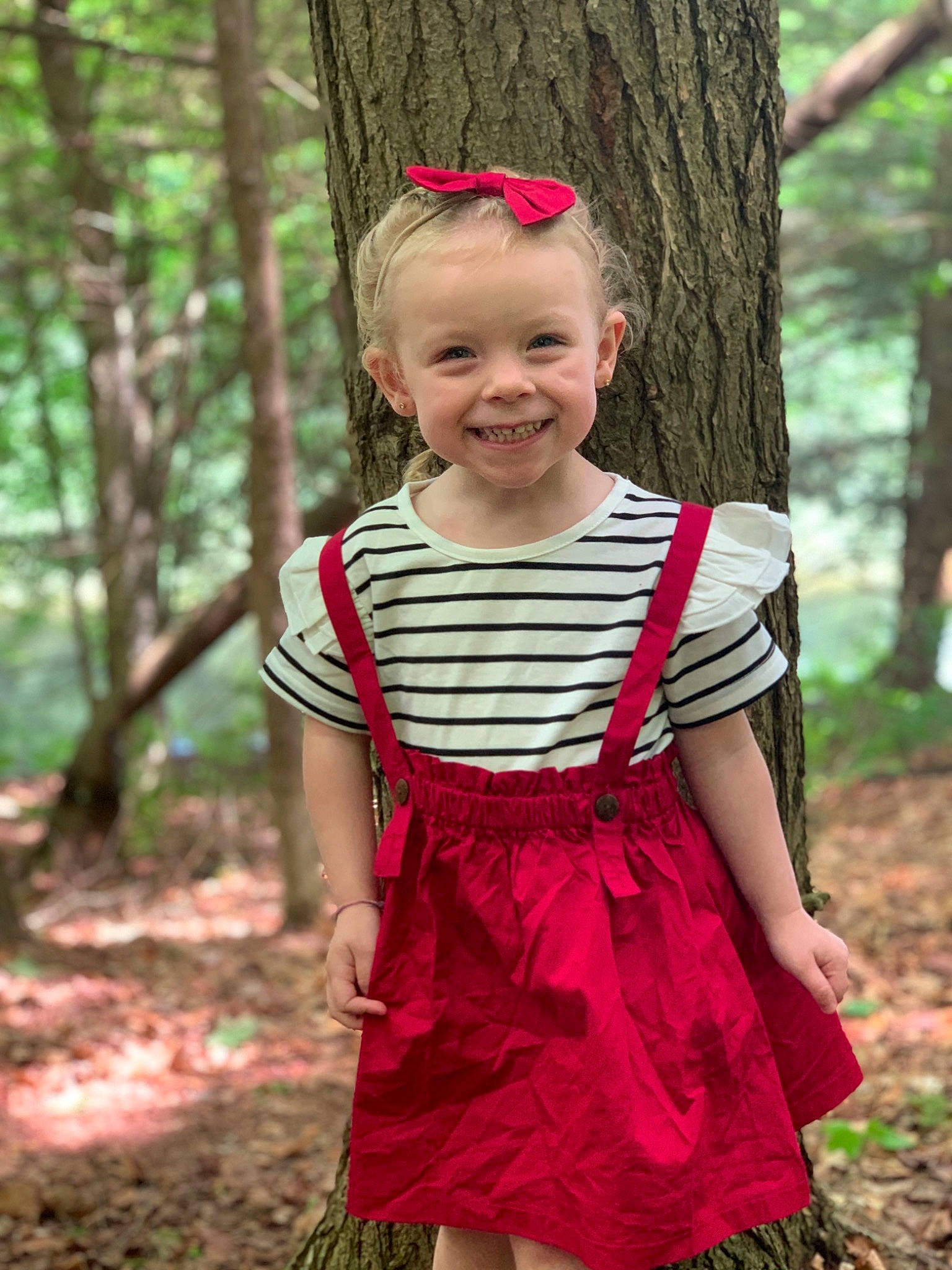 Draven is registered to the contest to win money with this photo: baby_toddler_clothing, child, child_model, clothing, costume, dress, joy, pattern, person, pink, plant, smile, toddler, tree