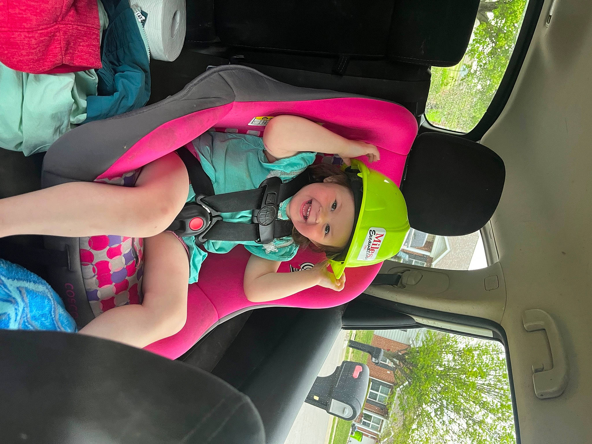 Pearl joined the competition — help win amazing prizes! auto_part, automotive_exterior, baby_toddler_clothing, child, comfort, fun, green, hat, headwear, human_body, human_leg, joy, lap, leisure, magenta, person, pink, plant, recreation, thigh