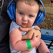 Levi joined the competition — help win amazing prizes! baby, headphones, blue_eyes, pout, wristband, socks, arm, hand, outdoor, autumn, leaves, person, holding, clothing, face, child, cute, portrait, nature, casual