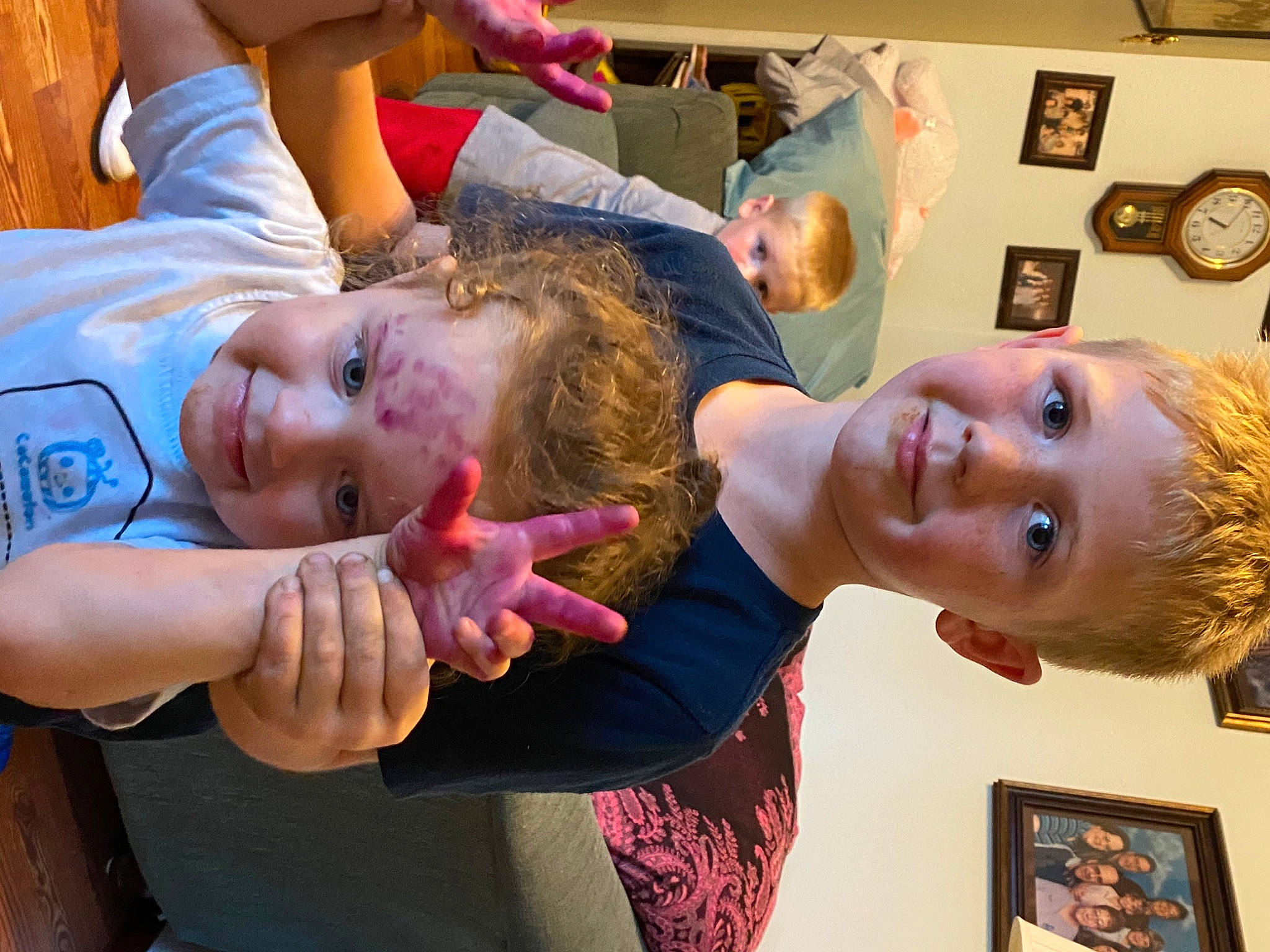 Hope is registered to the contest to win money with this photo: arm, art, blurred, cheek, child, community, ear, event, facial_expression, fun, gesture, hairstyle, happy, joy, leisure, mouth, muscle, person, picture_frame, smile