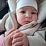 Beatrice participe au concours pour gagner de l'argent avec cette photo : baby, infant, child, face, eyes, hat, beanie, coat, jacket, blanket, fur_hood, car_seat, car_interior, holding_hand, hand, close_up, portrait, winter_clothing, plush, button