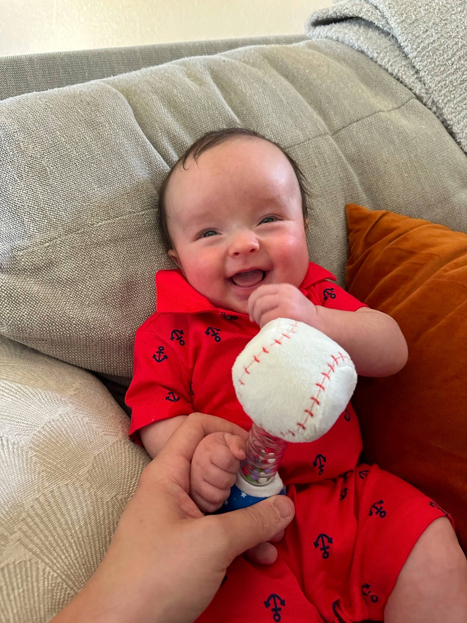 Tripp joined the competition — help win amazing prizes! baby, baby_toddler_clothing, cheek, child, comfort, couch, face, finger, gesture, hand, happy, head, joy, nail, person, skin, smile, t_shirt, textile, thumb