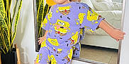 Matthew Bas joined the competition — help win amazing prizes! bedroom, black_sunglasses, casual, child, decor, fashion, fun, home, indoor, kid, mirror, plant, posing, purple_outfit, reflection, sandals, smiling, spongebob_clothing, tile_floor, yellow_cap