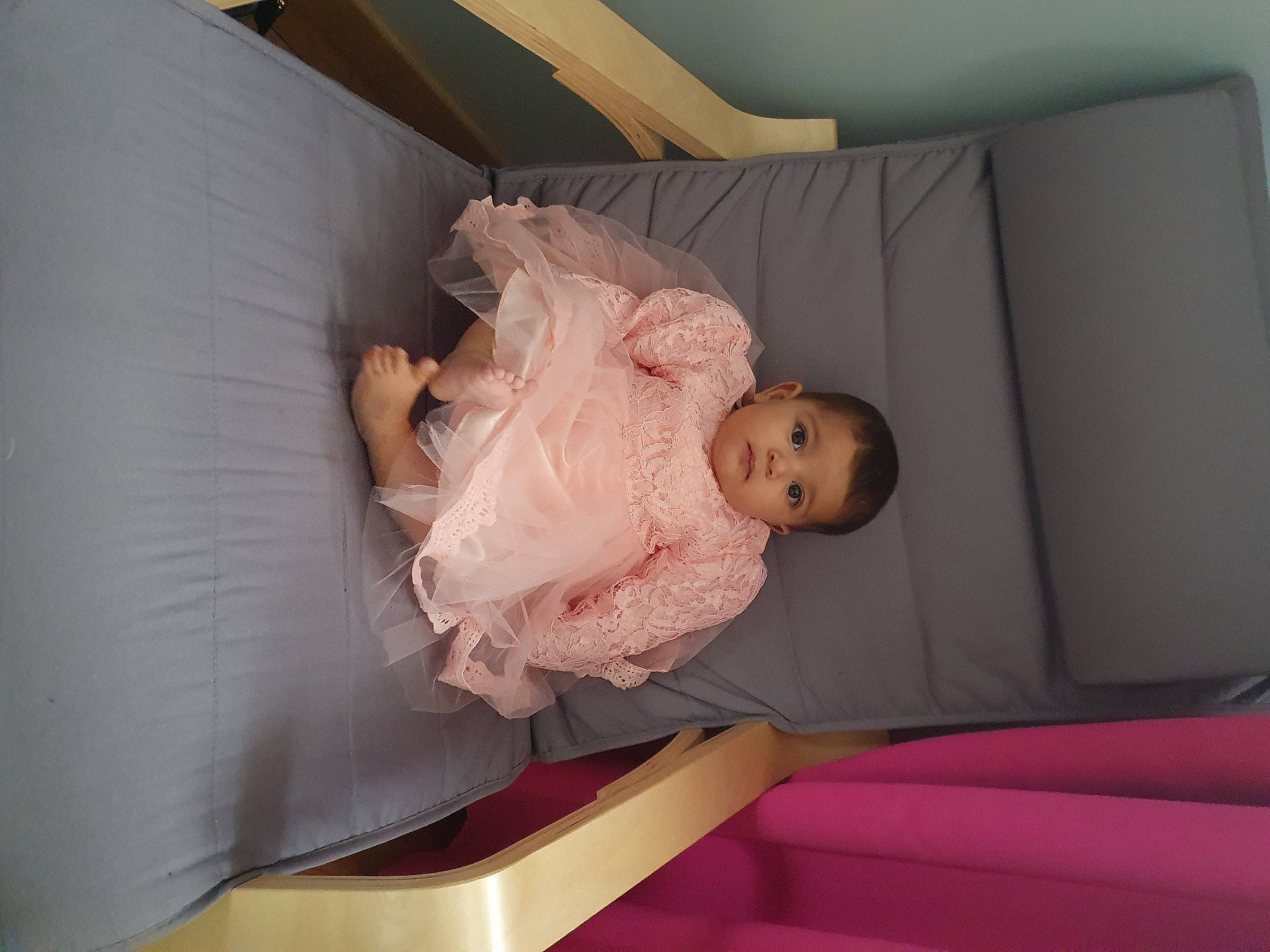 Aya participe au concours pour gagner de l'argent avec cette photo : baby, baby_products, baby_safety, baby_toddler_clothing, bed, bed_sheet, bedding, bedroom, child, comfort, couch, flooring, leisure, linens, nap, person, pink, room, sitting, toddler