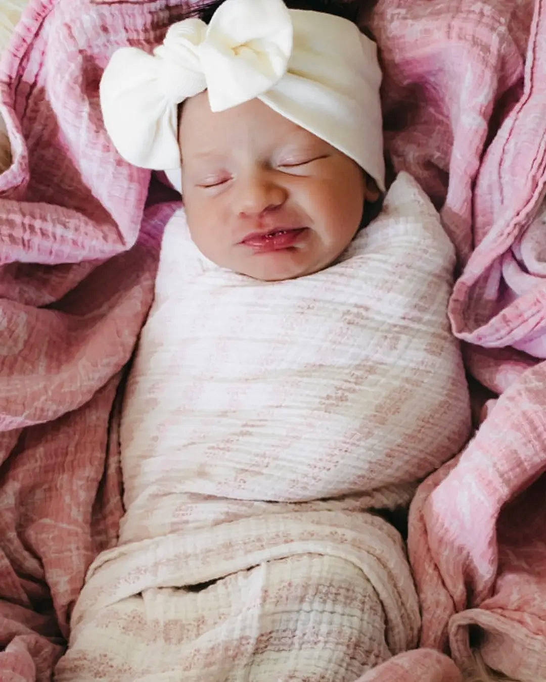 Chevelle joined the competition — help win amazing prizes! baby, baby_sleeping, baby_toddler_clothing, child, comfort, face, fashion_accessory, fur, headgear, headwear, hood, linens, magenta, peach, person, petal, pink, portrait_photography, sleeve, toddler