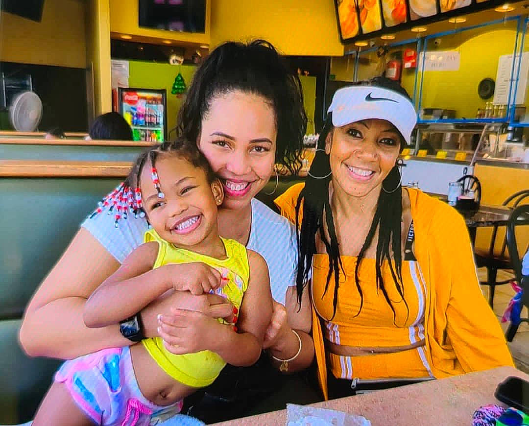 Rhyann is registered to the contest to win money with this photo: chair, child, customer, event, fun, happy, headwear, joy, leisure, party, people, person, picture_frame, recreation, room, shorts, smile, snapshot, t_shirt, thigh