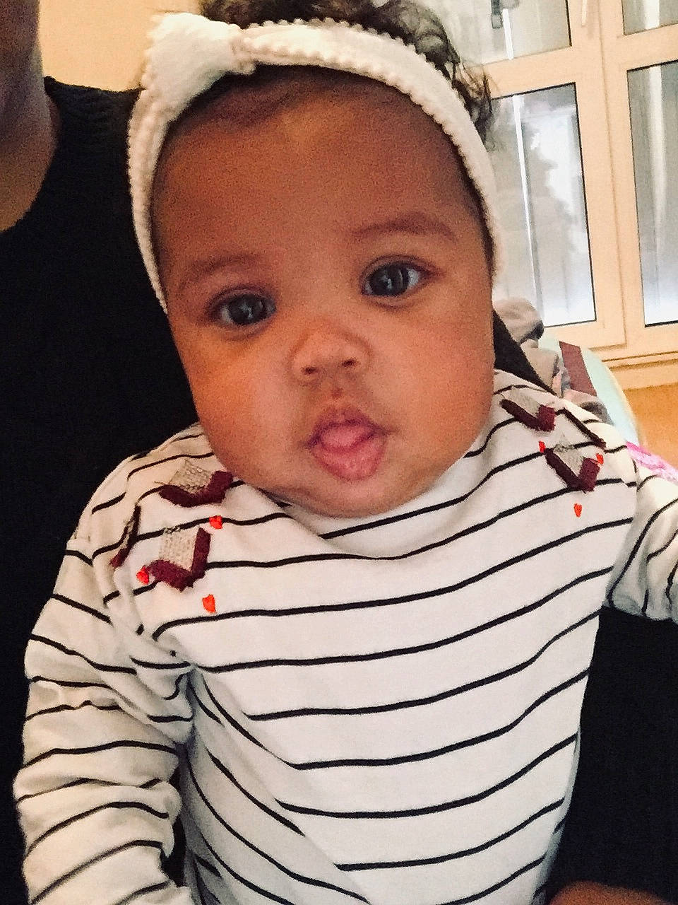 Siah participe au concours pour gagner de l'argent avec cette photo : cap, cheek, child, cool, day, ear, eye, face, girl, hair_accessory, head, headgear, infant, neck, nose, organ, person, product, skin, smile