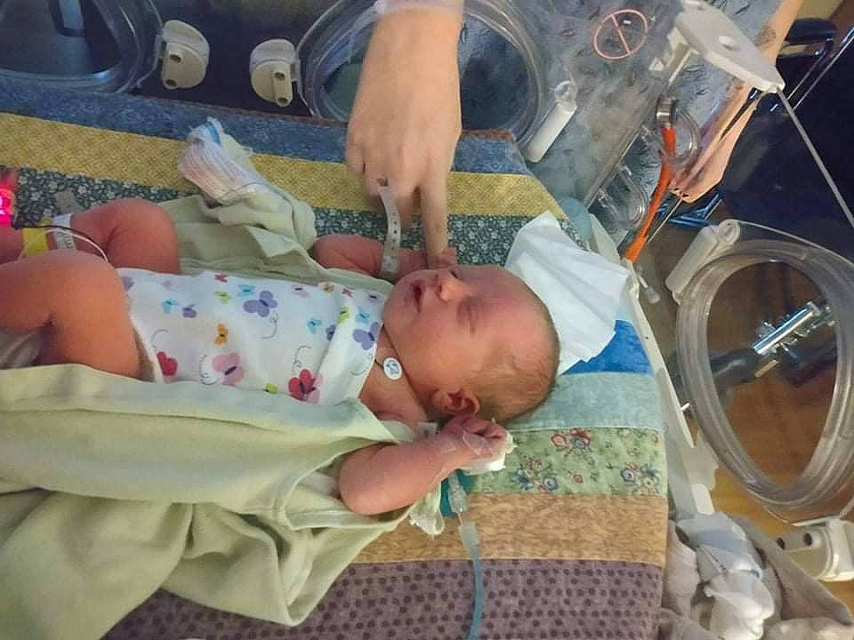 Davina is registered to the contest to win money with this photo: astronaut, baby, baby_products, baby_toddler_clothing, child, circle, comfort, engineering, event, laundry_room, machine, organ, person, room, service, toddler