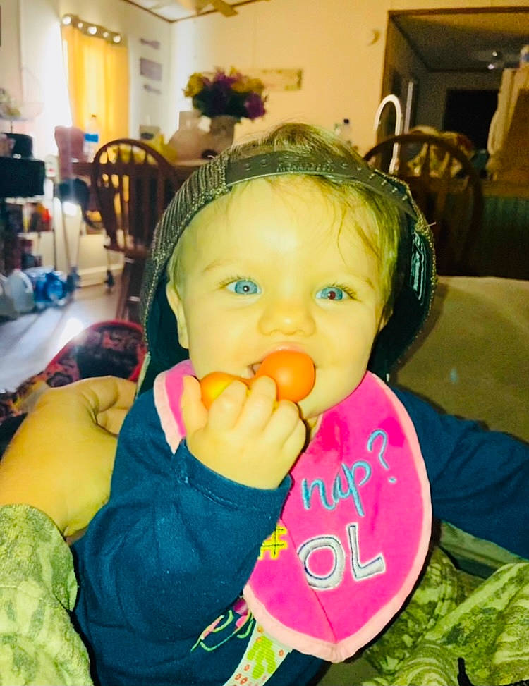 Chloe is registered to the contest to win money with this photo: baby, baby_toddler_clothing, balloon, chair, cheek, child, ear, fun, hairstyle, happy, iris, mouth, nose, party, person, play, room, sitting, skin, sweetness