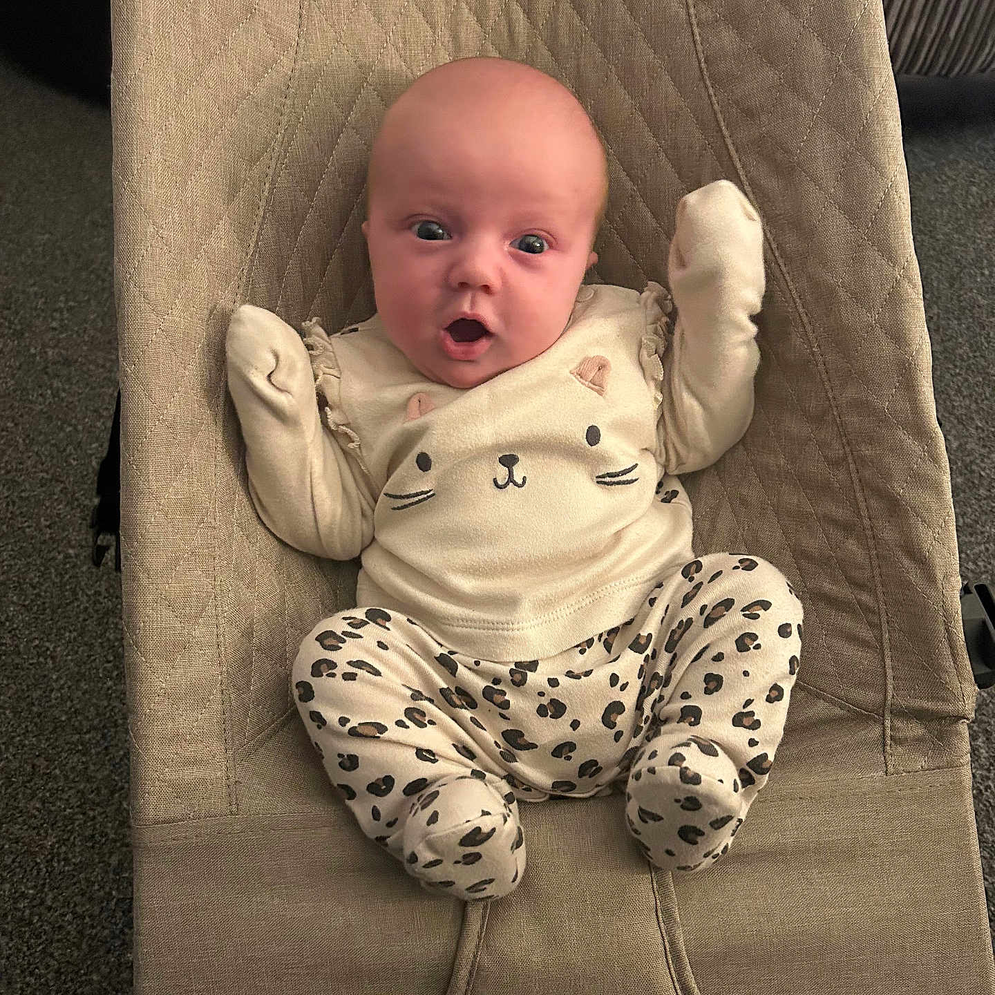Harper is registered to the contest to win money with this photo: baby, chair, clothing, couch, cushion, face, furniture, glove, head, homedecor, hosiery, newborn, pajamas, person, photography, portrait, sock, yawning