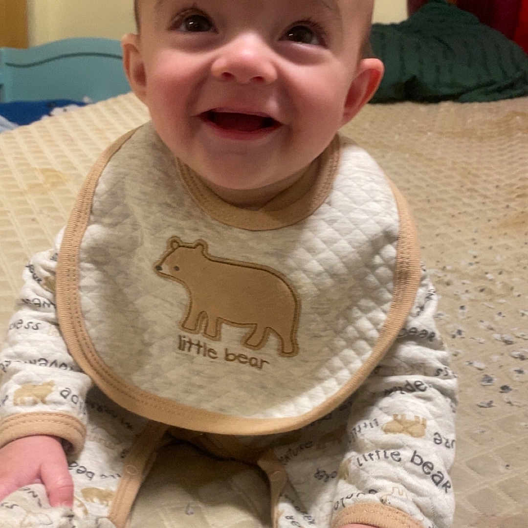 Jaxson joined the competition — help win amazing prizes! baby, bed, bedroom, bodypart, cutlery, face, furniture, happy, head, indoors, laughing, mouth, person, photography, portrait, room, sitting, smile, spoon, teeth