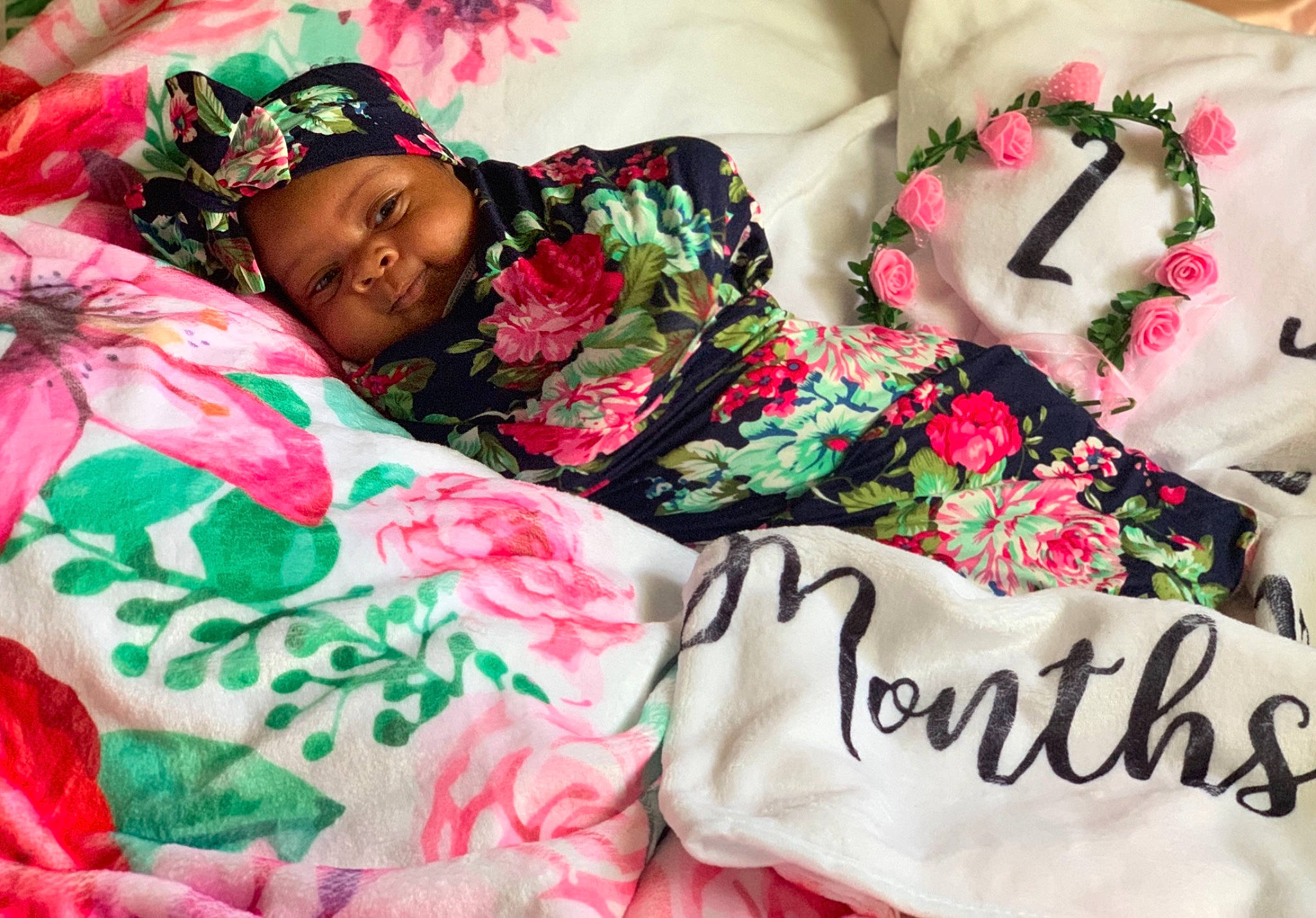 Tiana joined the competition — help win amazing prizes! baby_toddler_clothing, beauty, black_hair, child, comfort, event, eyelash, fashion, flower, happy, headgear, headwear, linens, magenta, pattern, person, petal, pink, product, skin