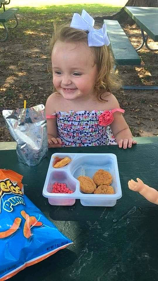 Zaiya is registered to the contest to win money with this photo: child, comfort_food, eating, food, joy, lunch, meal, person, picnic, play, recreation, toddler
