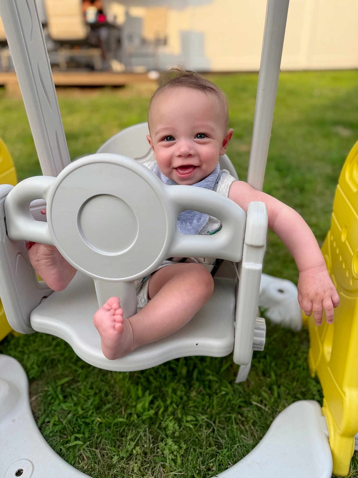 Oliver joined the competition — help win amazing prizes! baby, swing, outdoor, grass, playground, child, smiling, happy, plastic, seat, feet, hand, daylight, toy, fun, summer, cute, infant, play, nature