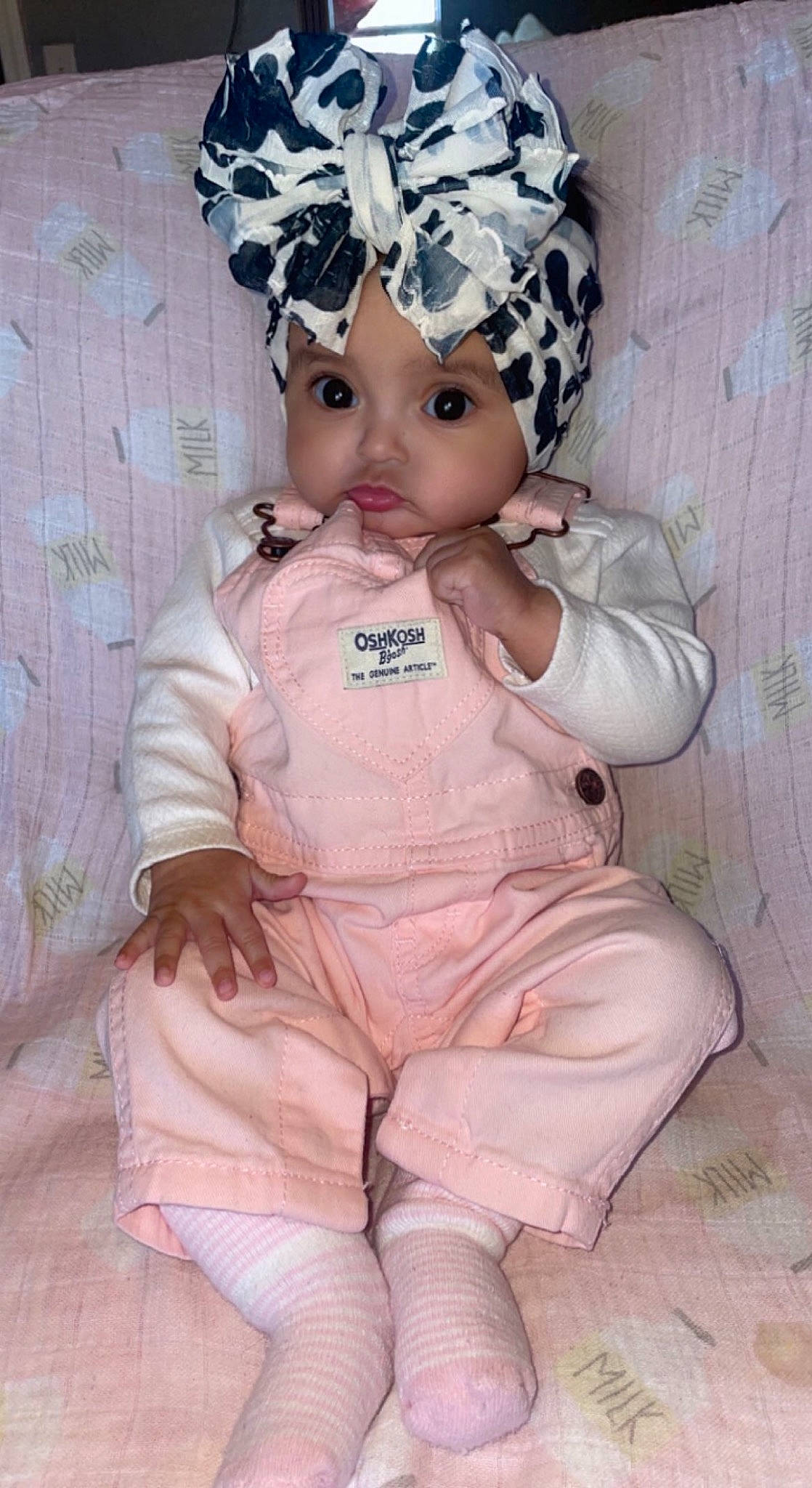 Adelina joined the competition — help win amazing prizes! baby, baby_toddler_clothing, cap, costume_hat, dress, eye, eyelash, face, fashion_accessory, fashion_design, head, headband, headpiece, headwear, linens, outerwear, pattern, peach, person, pink