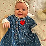 baby, child, infant, dress, headband, polka_dot, heart_pattern, teddy_bear, blanket, cute, smiling, portrait, indoor, soft_toys, baby_clothing, happy, lying_down, closeup, adorable, person