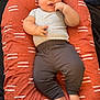 Liam joined the competition — help win amazing prizes! baby, infant, child, cushion, striped_shirt, grey_pants, barefoot, hair_tuft, curious_expression, indoors, soft_fabric, resting, cute, portrait, one_person, human, relaxing, casual_clothing, skin, face