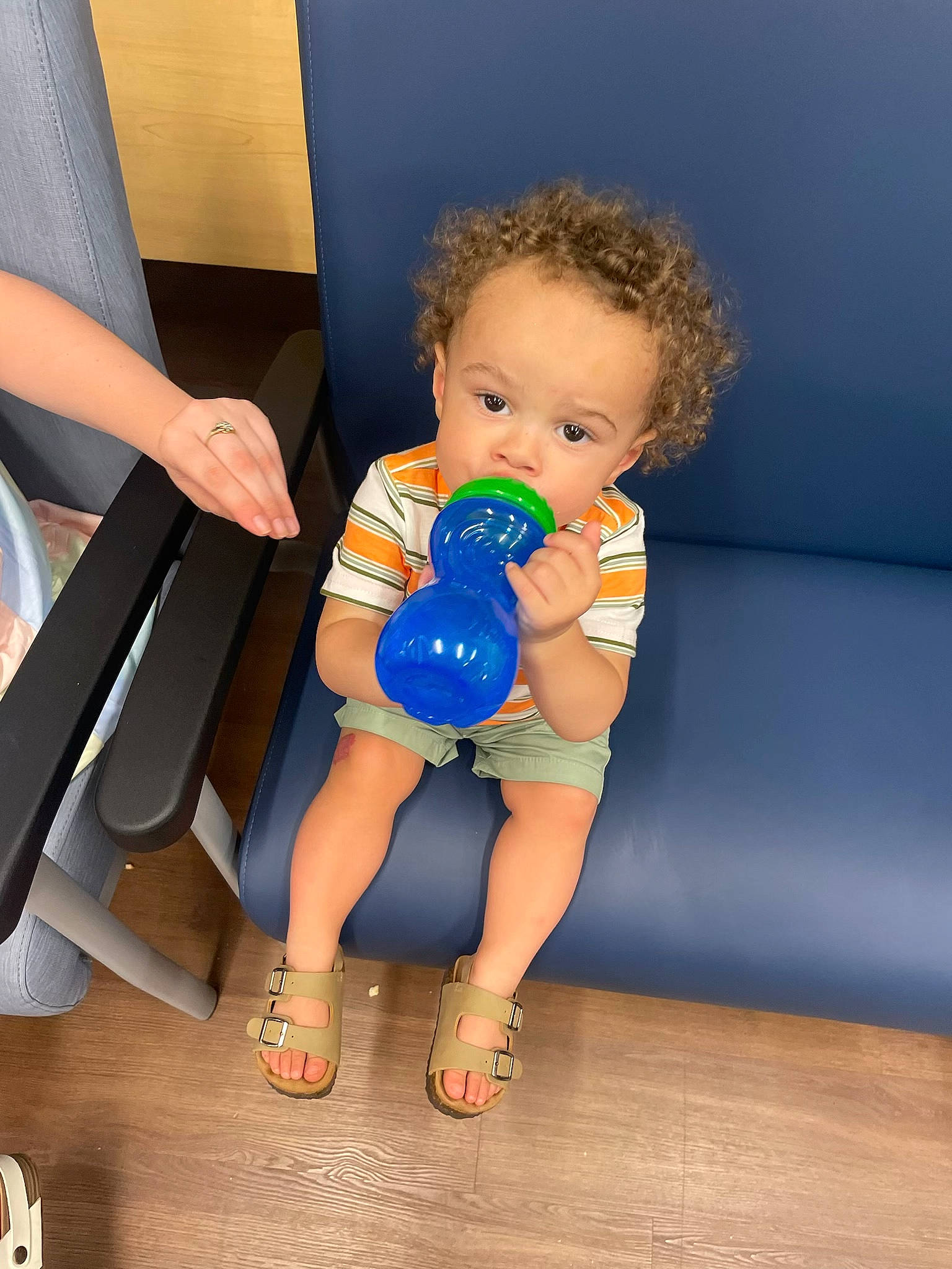 Kayson is registered to the contest to win money with this photo: arm, baby, baby_toddler_clothing, barefoot, child, electric_blue, finger, flooring, foot, fun, happy, hardwood, human_leg, joint, leisure, person, shoulder, sitting, thigh, toddler