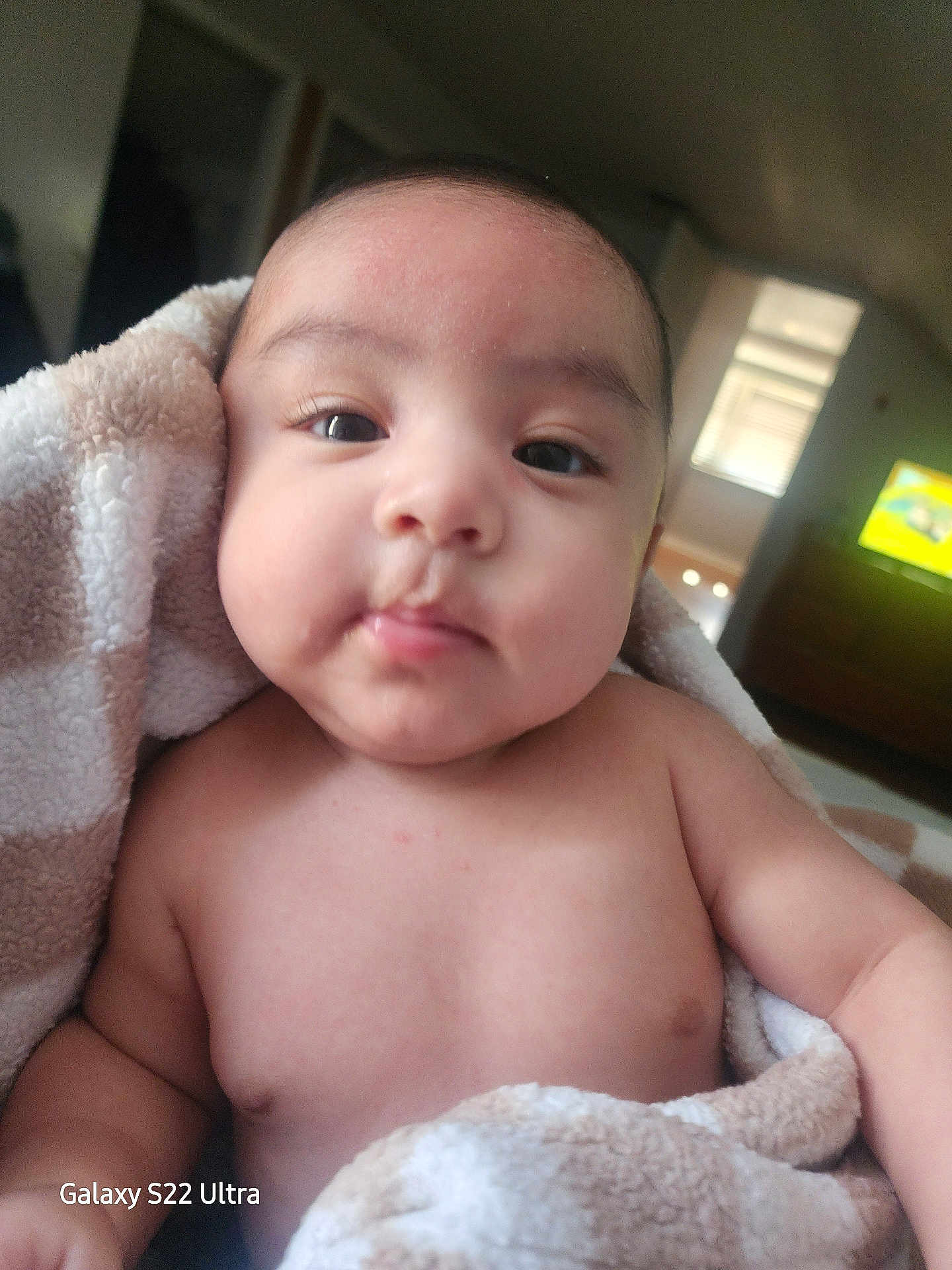 Bodoquito joined the competition — help win amazing prizes! baby, infant, child, toddler, blanket, towel, portrait, close_up, chubby_cheeks, big_eyes, face, skin, indoor, home, cozy, blanket_wrap, gaze, soft_lighting, bare_chest, camera_watermark