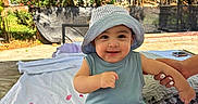 Bodoquito joined the competition — help win amazing prizes! baby, blanket, child, clothing, daylight, garden, hand, happy, hat, heart_pattern, nature, outdoor, person, playtime, romper, smile, sunlight, support, toddler, trees