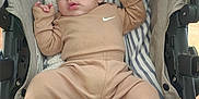 Bodoquito joined the competition — help win amazing prizes! baby, blanket, cozy, cute, drooling, hands, head, indoor, infant, legs, newborn, nike_logo, pajamas, peaceful, portrait, sleeping, soft_fabric, striped_blanket, stroller, tan_outfit