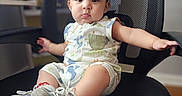 Bodoquito joined the competition — help win amazing prizes! armrest, baby, big_eyes, casual, child, chubby_cheeks, cute, dinosaur_print, expression, feet, hands, indoor, infant, mesh_chair, office_chair, onesie, portrait, sitting, sneakers, soft_lighting