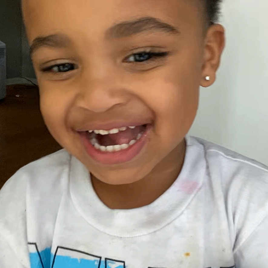 O Marius joined the competition — help win amazing prizes! adult, boy, casual_clothing, child, closeup, digital, earring, face, graphic_tee, happy, indoor, portrait, screen, short_hair, smiling, technology, teeth, toddler, video_call, white_tshirt