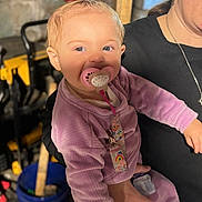 Aubri is registered to the contest to win money with this photo: adult, bucket, casual, child, cute, family, happy, holding, indoor, pacifier, person, playful, pony_tail, portrait, purple_clothing, smiling, sneakers, toddler, tools, young_child