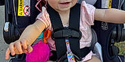 Aubri joined the competition — help win amazing prizes! arm, baby, car_seat, child, cute, happy, head, infant, leg, outdoor, person, pink_clothing, plush_toy, safety_harness, seat, seatbelt, skin, smiling, toy, warning_label