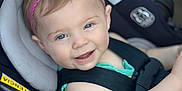 Aubri is registered to the contest to win money with this photo: baby, baby_girl, blue_eyes, car_seat, child, child_seat, closeup, cute, happy, headband, indoor, infant, person, pink_flower, portrait, safety, seatbelt, smiling, teal_outfit, young_child