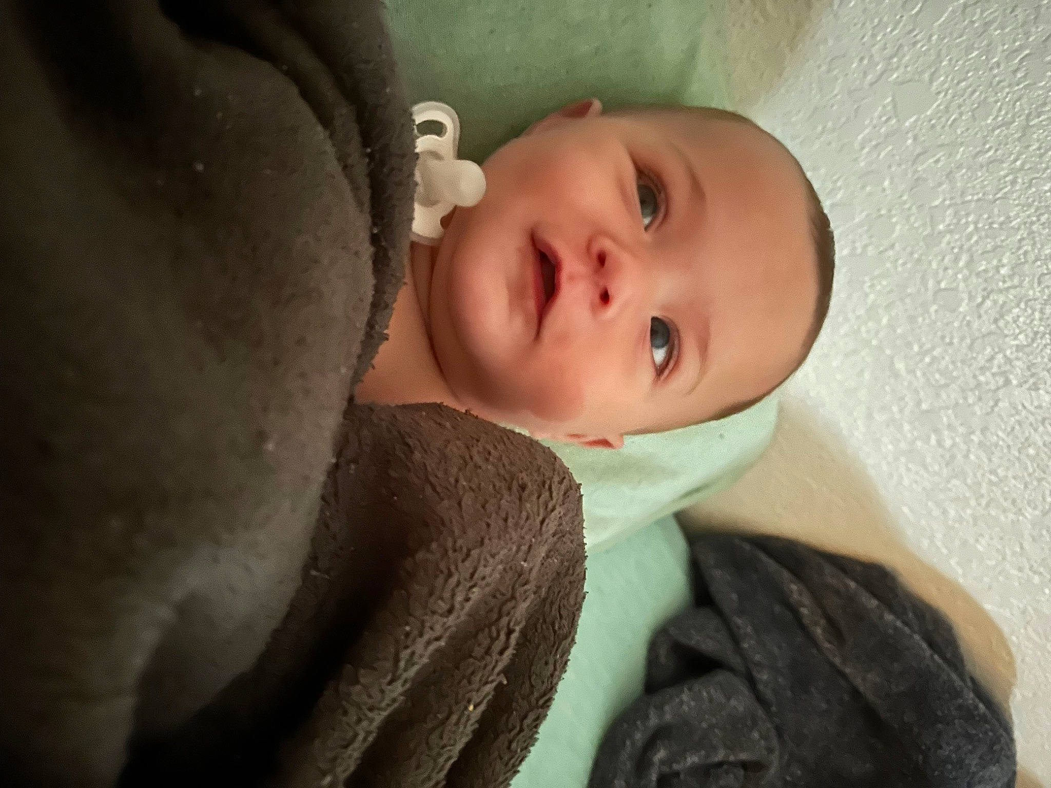 Link is registered to the contest to win money with this photo: baby, cheek, comfort, ear, eyelash, flash_photography, fun, fur, hair, happy, headgear, iris, lip, neck, nose, person, sitting, sleeve, smile, toddler