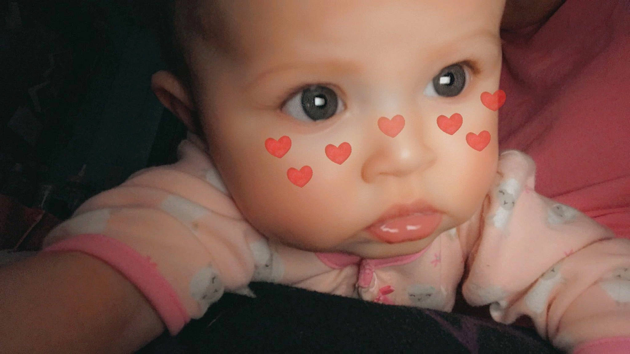 Fayth is registered to the contest to win money with this photo: baby, cheek, child, chin, close_up, ear, eye, eyebrow, face, finger, forehead, hand, head, iris, lip, mouth, nose, person, pink, skin