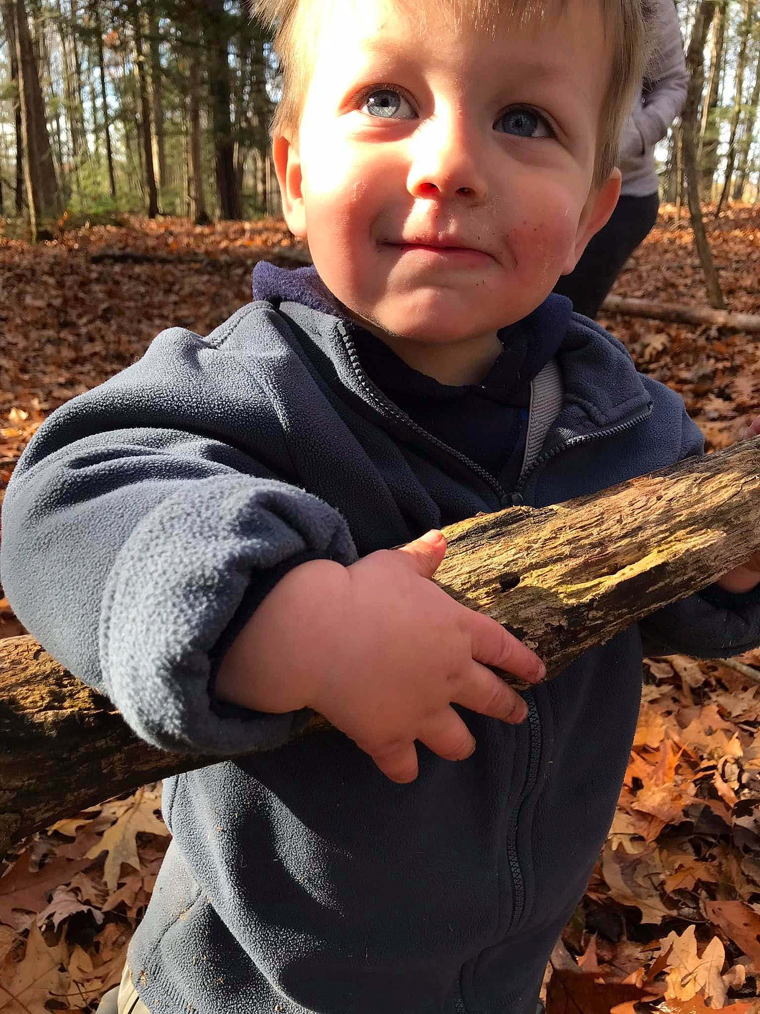 Henri joined the competition — help win amazing prizes! baby_toddler_clothing, child, face, facial_expression, finger, gesture, grass, happy, joy, leaf, pattern, people_in_nature, person, plant, sleeve, smile, soil, thumb, toddler, tree