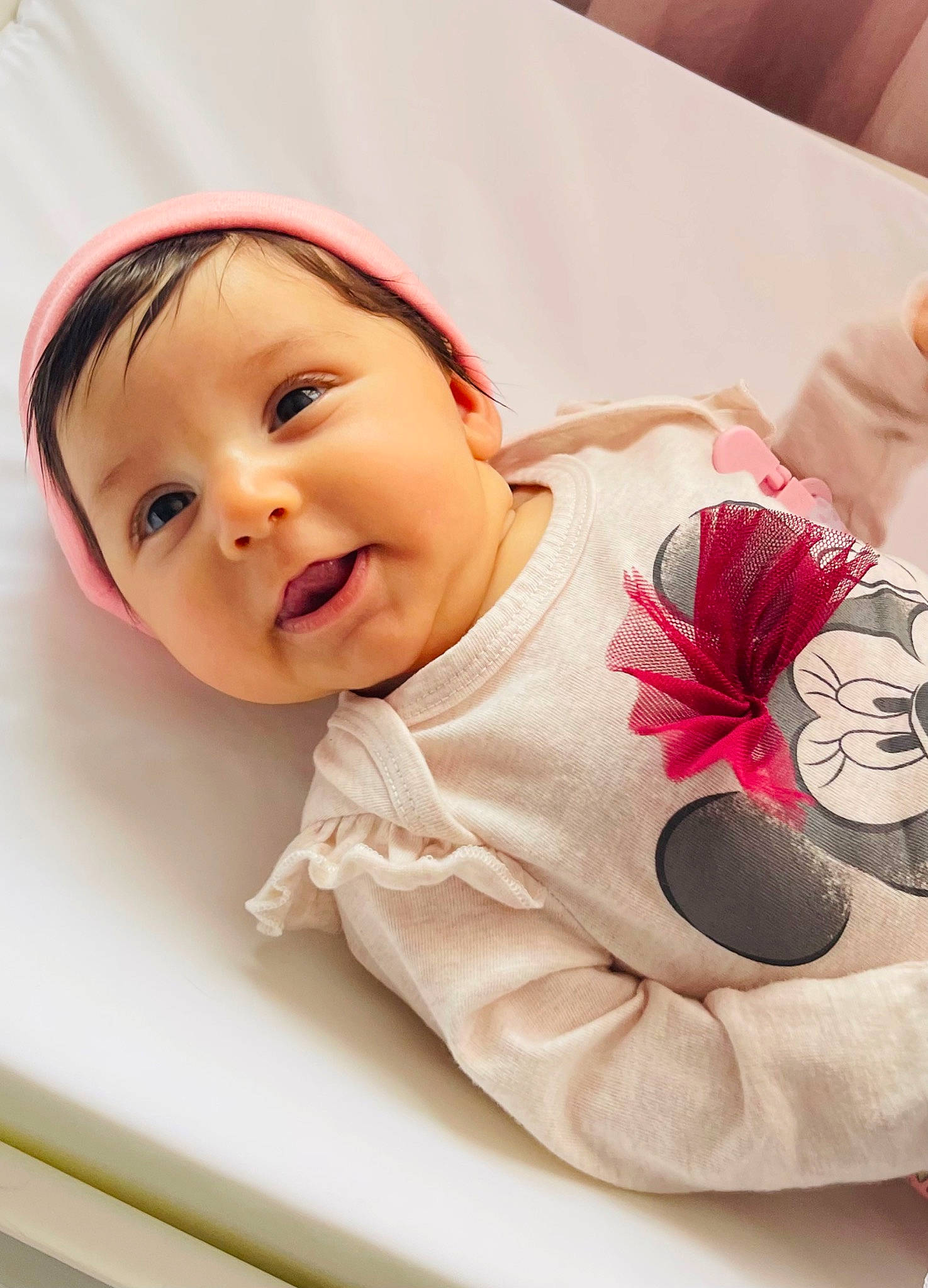 Alivia joined the competition — help win amazing prizes! baby, baby_toddler_clothing, carmine, cheek, child, comfort, face, facial_expression, flower, happy, linens, magenta, person, petal, pink, portrait_photography, room, skin, sleeve, smile