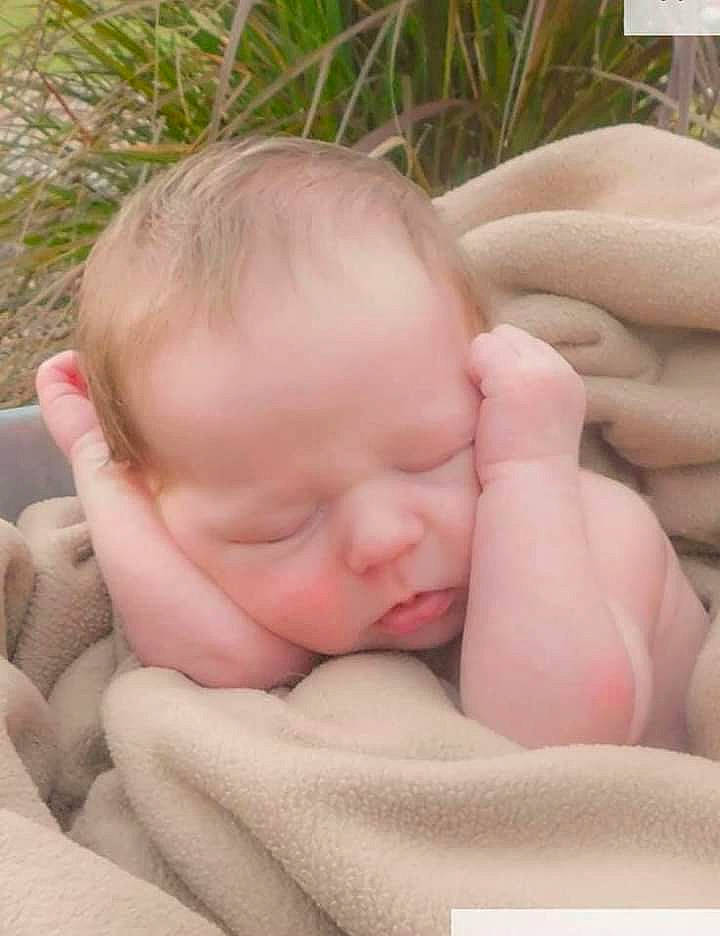 Chase is registered to the contest to win money with this photo: baby, cheek, child, face, finger, hand, lip, mouth, nose, person, pink, skin, sleep, toddler