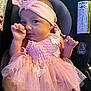 Perscilla joined the competition — help win amazing prizes! baby, infant, pink_tutu, headband, car_seat, safety_warning, cute, child, tulle, butterfly_applique, hand, thumb_sucking, portrait, seatbelt, indoor, closeup, adorable, newborn, fashion, child_safety