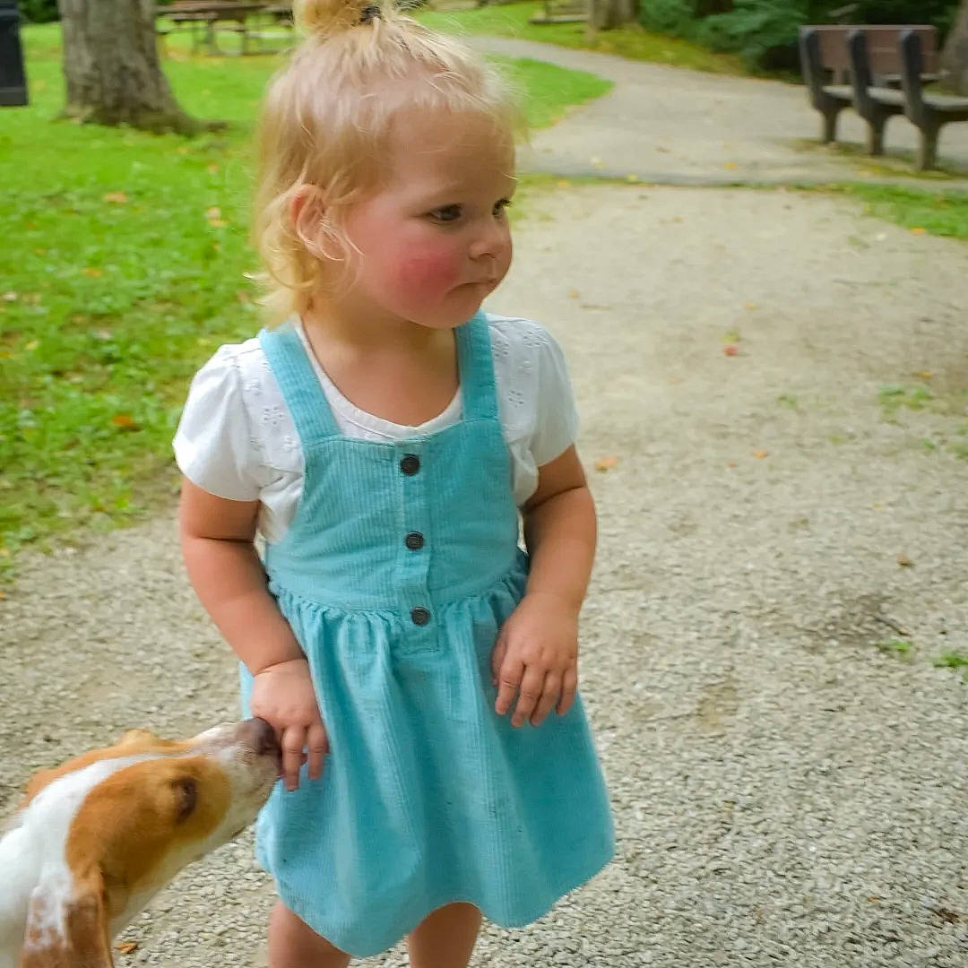 Raelynn joined the competition — help win amazing prizes! baby_toddler_clothing, carnivore, dress, facial_expression, grass, green, hairstyle, hand, happy, joint, leisure, people_in_nature, person, photograph, plant, recreation, shoulder, sleeve, summer, t_shirt