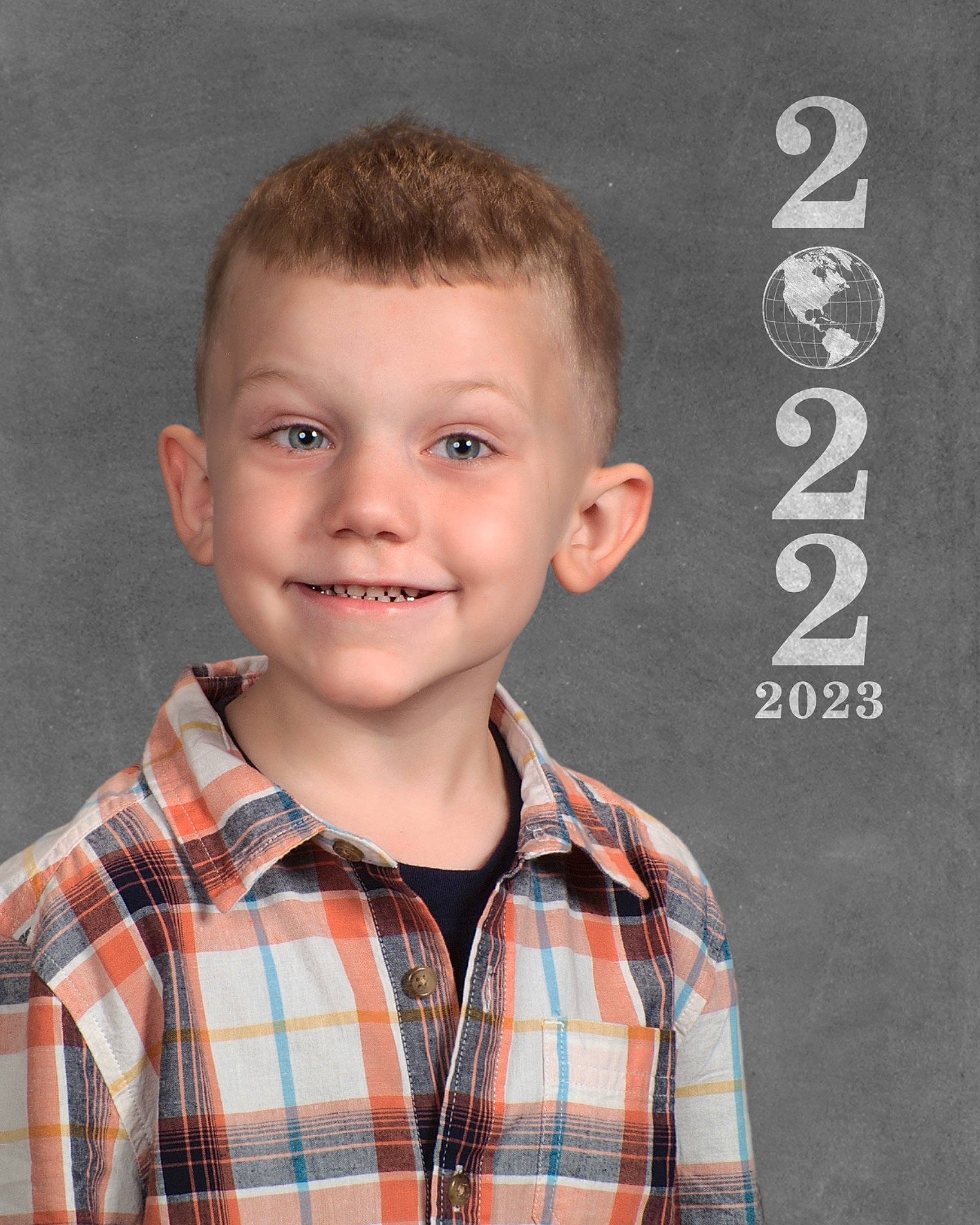 Wyatt is registered to the contest to win money with this photo: blond, brown_hair, cheek, child, chin, collar, dress_shirt, eyebrow, eyelash, flash_photography, forehead, hair, happy, joy, pattern, person, plaid, sleeve, smile, standing