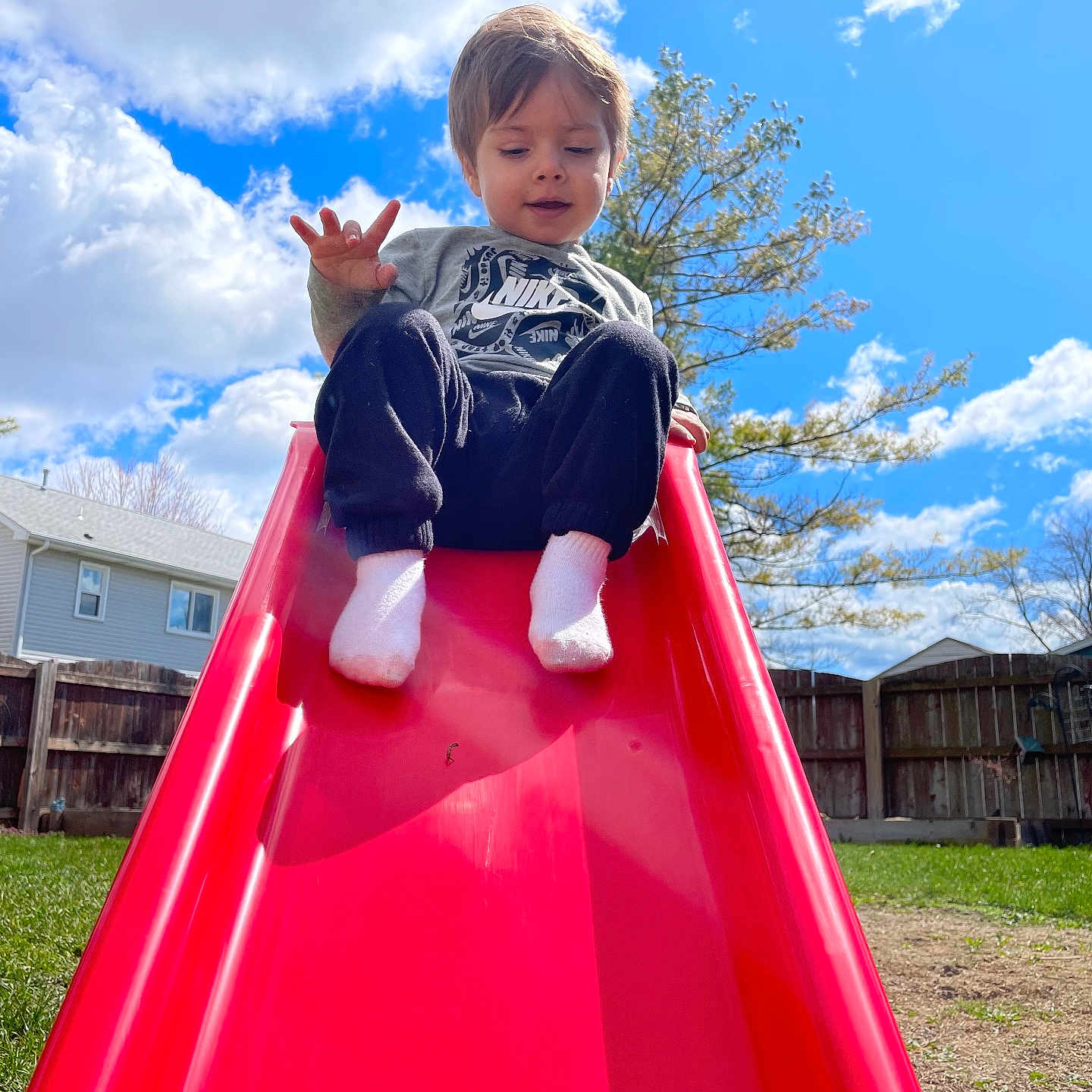 Ezra joined the competition — help win amazing prizes! architecture, baby, clothing, face, grass, head, hosiery, outdoorplayarea, outdoors, pants, person, photography, plant, playarea, portrait, sitting, slide, sliding, sock, toy