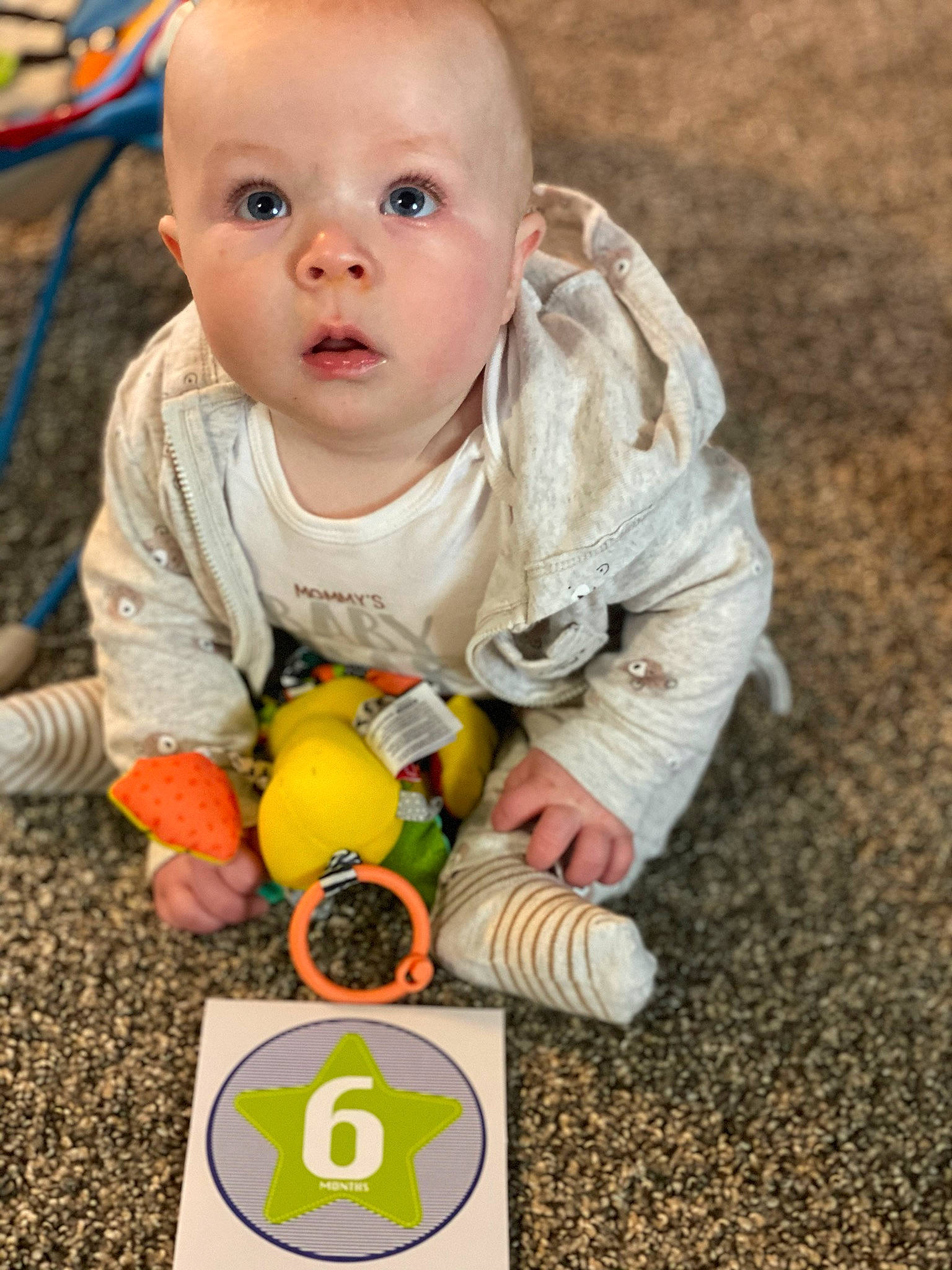 Mitchell joined the competition — help win amazing prizes! baby, baby_products, baby_toys, child, eye, head, person, play, product, sitting, skin, smile, surprise, toddler, toy, yellow