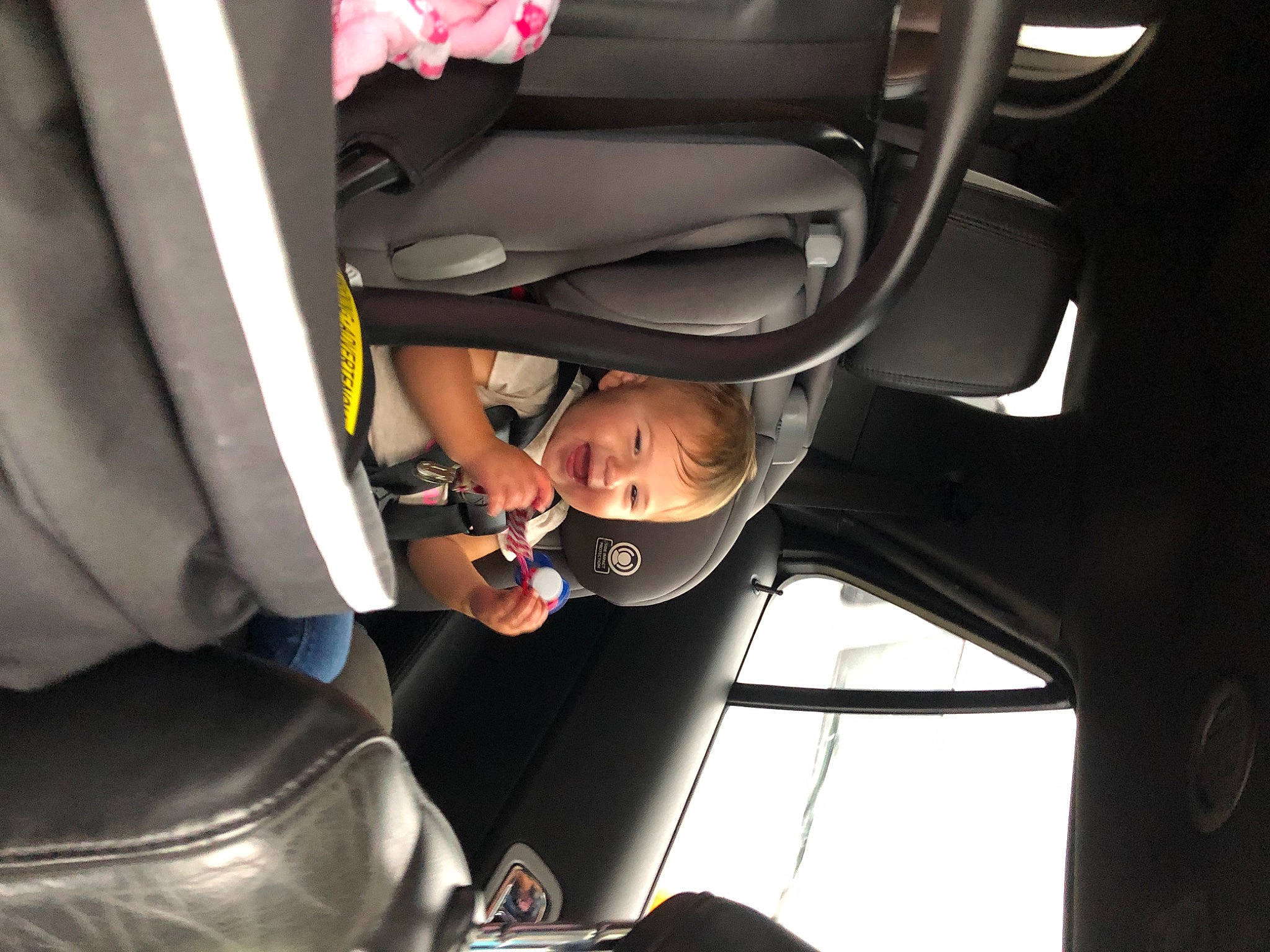 Brooklyn is registered to the contest to win money with this photo: auto_part, automotive_design, automotive_exterior, automotive_lighting, automotive_tire, automotive_wheel_system, car, car_seat, car_seat_cover, comfort, family_car, head_restraint, motor_vehicle, person, personal_luxury_car, steering_part, steering_wheel, toddler, vehicle, vehicle_door