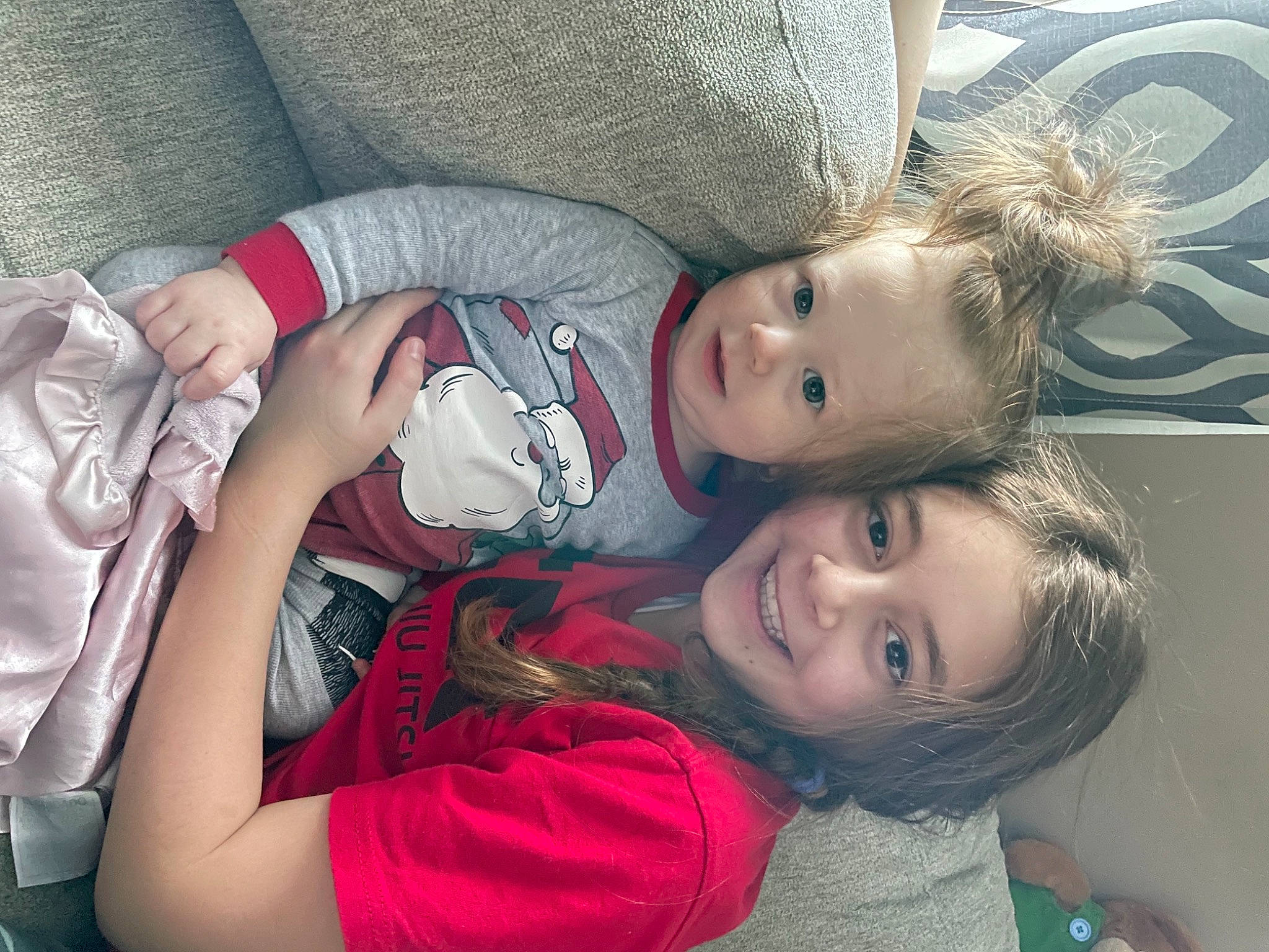 Maddie is registered to the contest to win money with this photo: arm, cheek, clothing, comfort, cool, face, facial_expression, gesture, happy, human, human_body, iris, joy, lip, mouth, nose, person, product, skin, smile