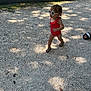 toddler, child, sunglasses, swimsuit, walking, outdoor, gravel, shadow, sunlight, footwear, sandal, person, summer, fashion, cute, playful, sunny, nature, casual, portrait