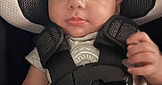 Leo joined the competition — help win amazing prizes! baby, infant, car_seat, child, seatbelt, straps, headrest, clothing, person, portrait, indoor, safety, cute, smile, young, skin, face, hand, comfort, babywear