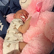 Leo joined the competition — help win amazing prizes! baby, sleeping, pacifier, teddy_bear, pink, plush, soft, cuddle, blanket, bed, infant, cute, child, comfort, toy, one_person, indoors, peaceful, rest, sleepwear