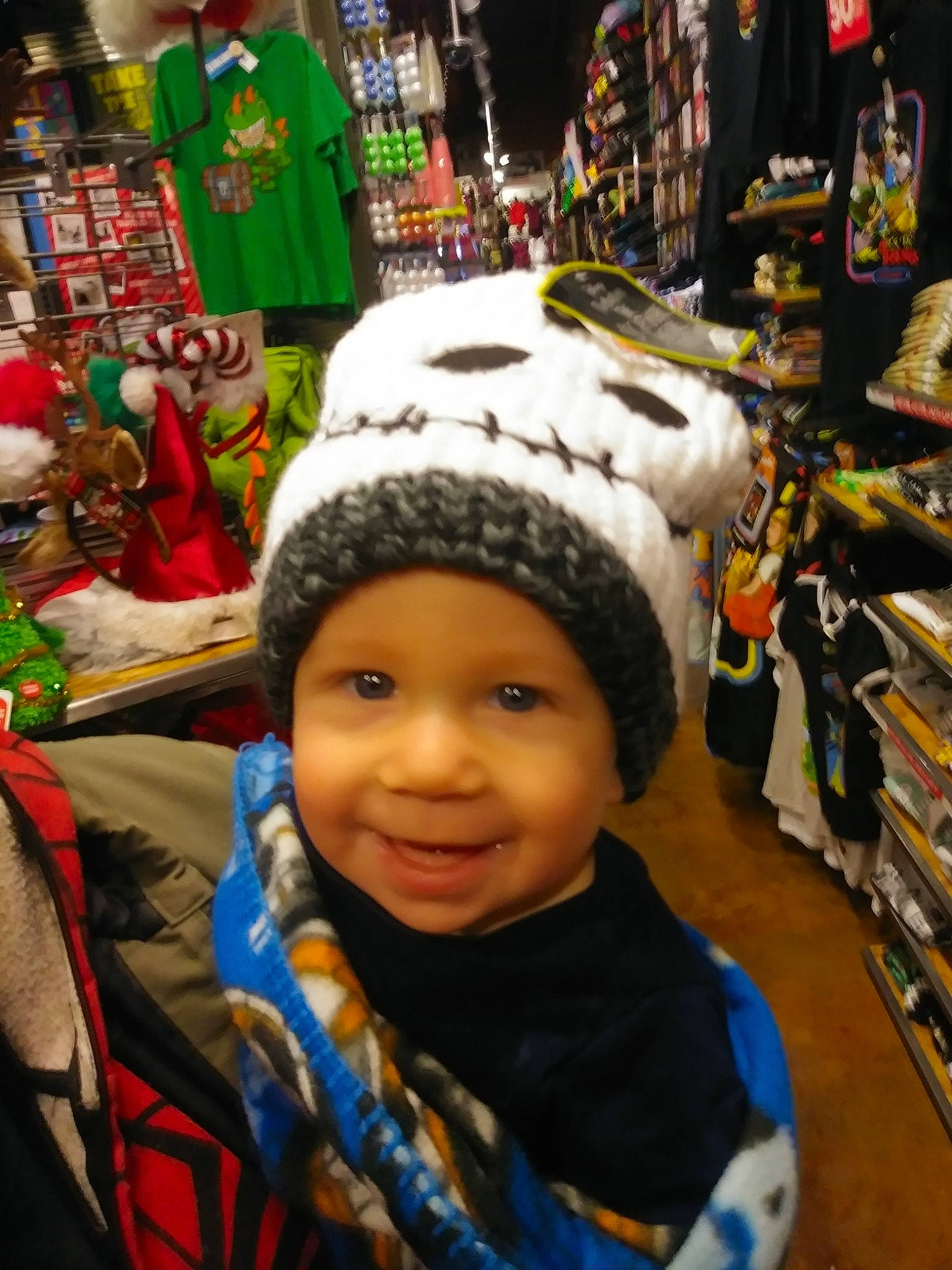 Lucius joined the competition — help win amazing prizes! cap, child, christmas, event, fashion_accessory, girl, hat, headgear, headwear, holiday, joy, person, product, public_space, toddler