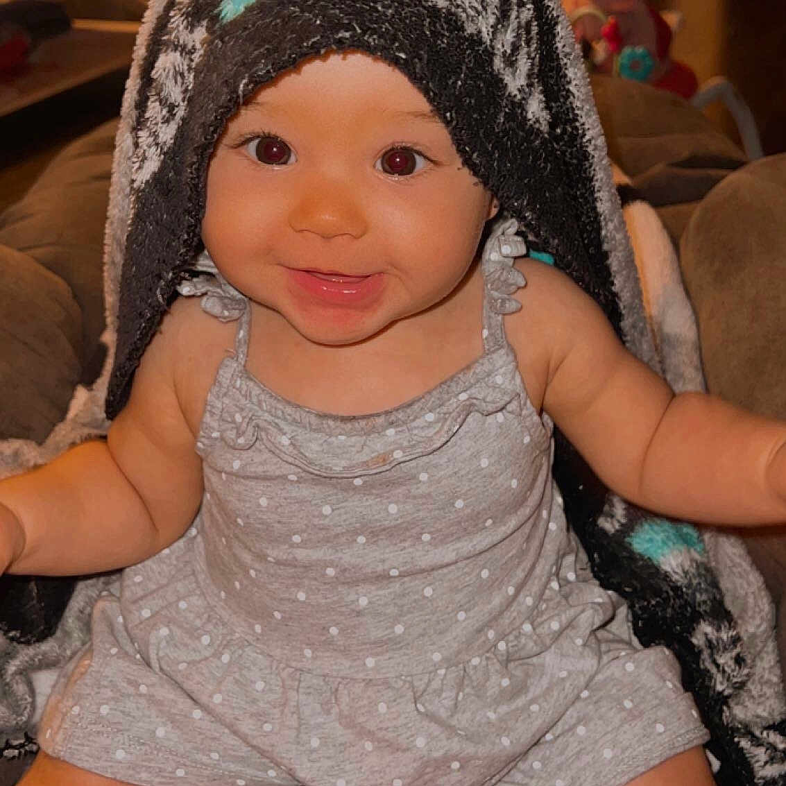 Sunni joined the competition — help win amazing prizes! baby, baby_toddler_clothing, cap, chair, cheek, child, chin, eye, finger, fun, happy, head, human_leg, iris, knit_cap, pink, skin, smile, thigh, toddler