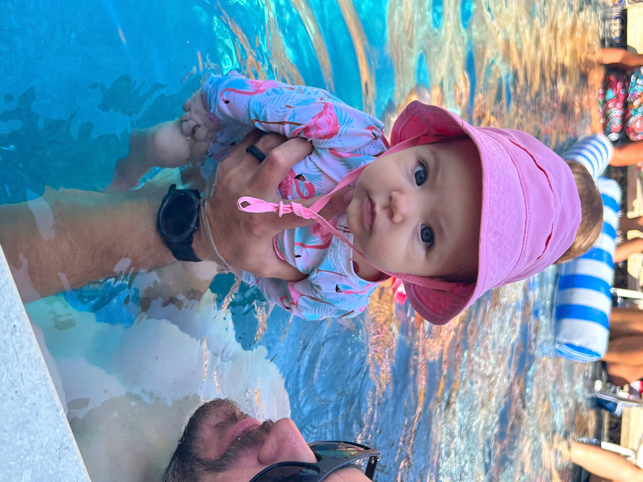 Zoey joined the competition — help win amazing prizes! baby, baby_toddler_clothing, blue, cap, child, electric_blue, event, fun, happy, hat, headgear, headwear, leisure, mouth, person, photograph, pink, recreation, sun_hat, swimming_pool