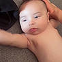 Papalovy is registered to the contest to win money with this photo: arm, baby, child, closeup, couch, cute, diaper, expression, fabric, face, hand, head, indoor, infant, lying_down, person, relaxing, skin, soft_light, young