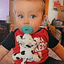 Waylan joined the competition — help win amazing prizes! toddler, child, pacifier, plush_toy, cow_toy, red_shirt, jeans, mohawk_hair, indoor, bed, furniture, face, person, cute, blue_eyes, expression, casual_clothing, toy, home, young_child